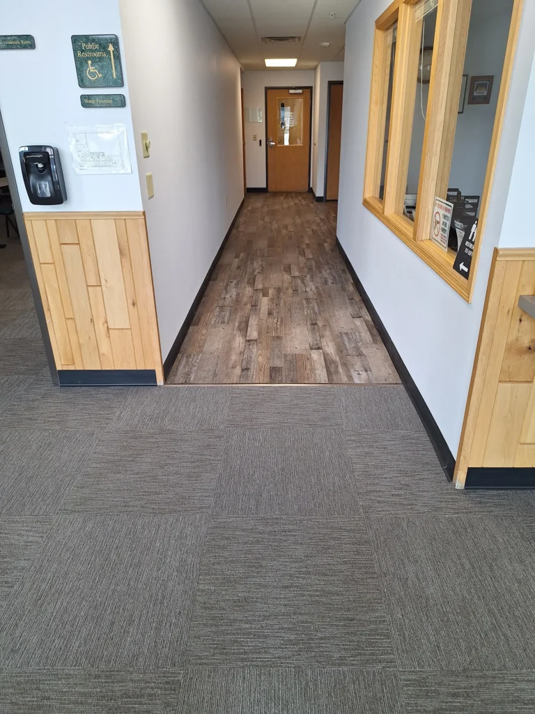 Job Center updated flooring by Felts Construction