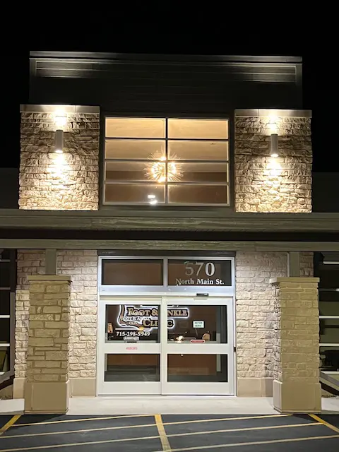 Finished front entrance at night - New Clinic Facility Build by Felts Construction