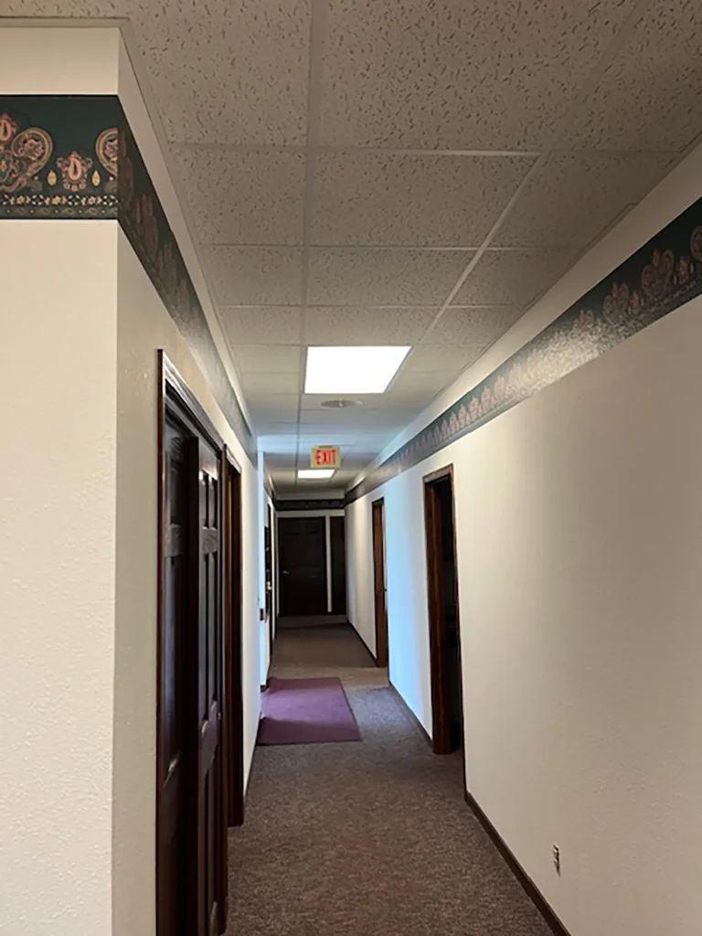 Before commercial hallway remodel by Felt's Construction
