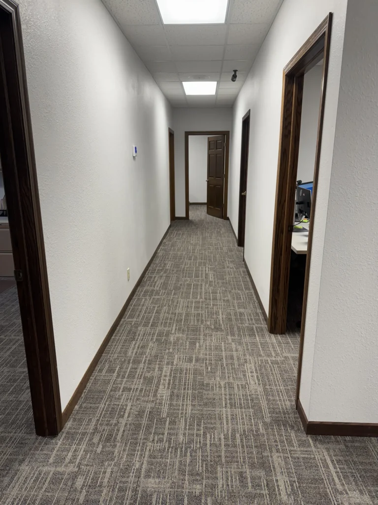 Completed commercial hallway remodel by Felt's Construction