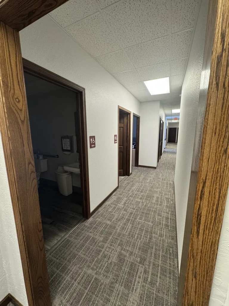 Completed commercial walls and flooring remodel by Felt's Construction