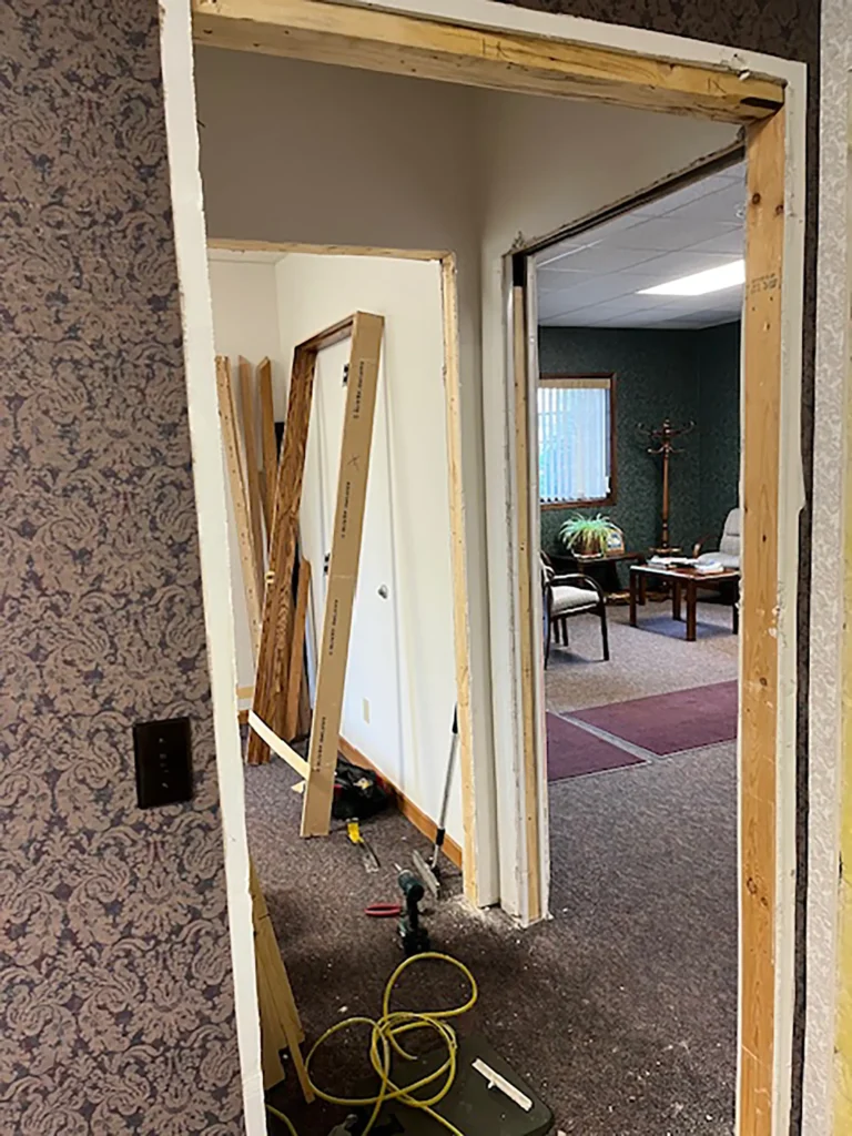 commercial hallway and door frame progress for Interior Remodel by Felts Construction